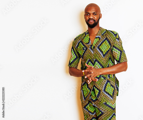 portrait of young handsome african man wearing bright green nati photo