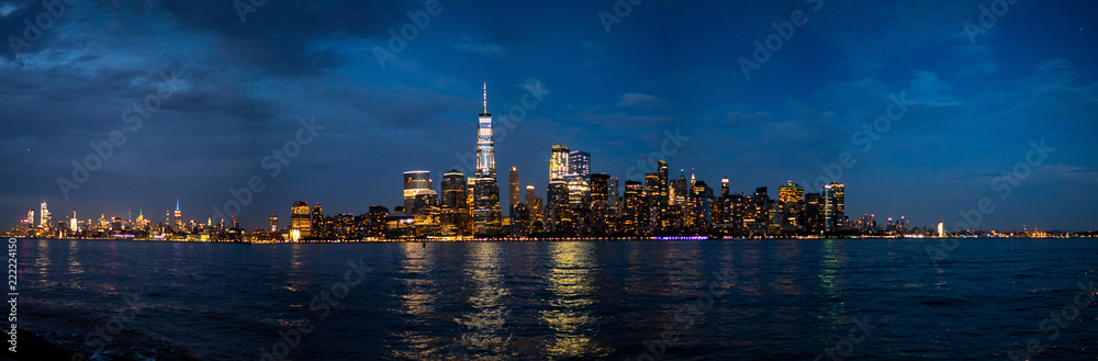 panoramic view of midtown and downtown Manhattan at night