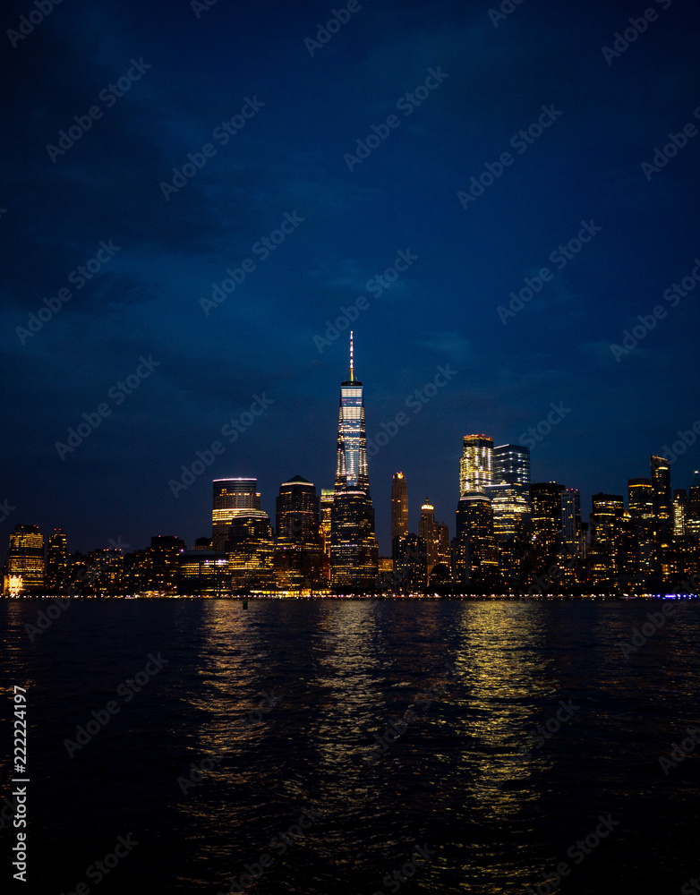 financial buildings in Manhattan at night