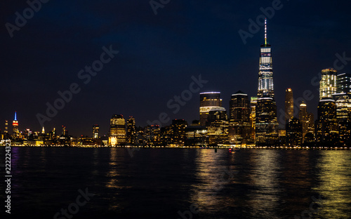 downtown and midtown Manhattan against dark blue sky