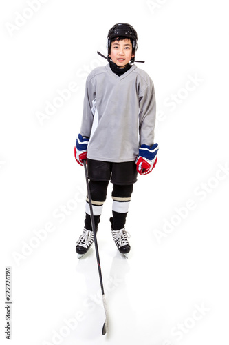 Junior Boy Ice Hockey Player Isolated on White Background