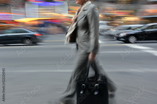 motion blurred business people walking on the street © bluraz