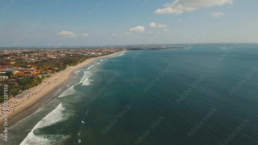 Aerial view of beautiful beach, hotels and tourists, Bali, Kuta. Beautiful view nice tropical beach from the air. Seascape, beach, ocean, sky sea 4K video, Travel concept, Aerial footage. Aerial view of beautiful beach, hotels and tourists, Bali, Kuta. Beautiful view nice tropical beach from the air. Seascape, beach, ocean, sky sea 4K video, Travel concept, Aerial footage.