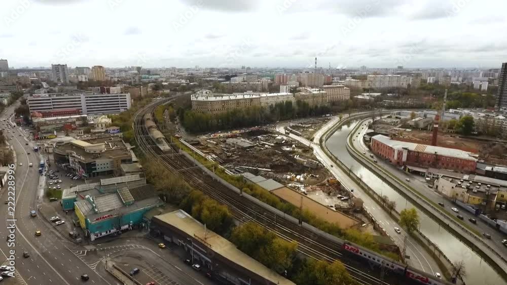 Aerial view. The river of the city of Moscow in a residential area of the city. Roads and buildings in the city Aerial view. The river of the city of Moscow in a residential area of the city. Roads and buildings in the city
