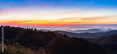 Colorful landscape view in early morning before the sunrise with misty covered mountain hills at Thong Pha Phum. Kanchanaburi  Thailand