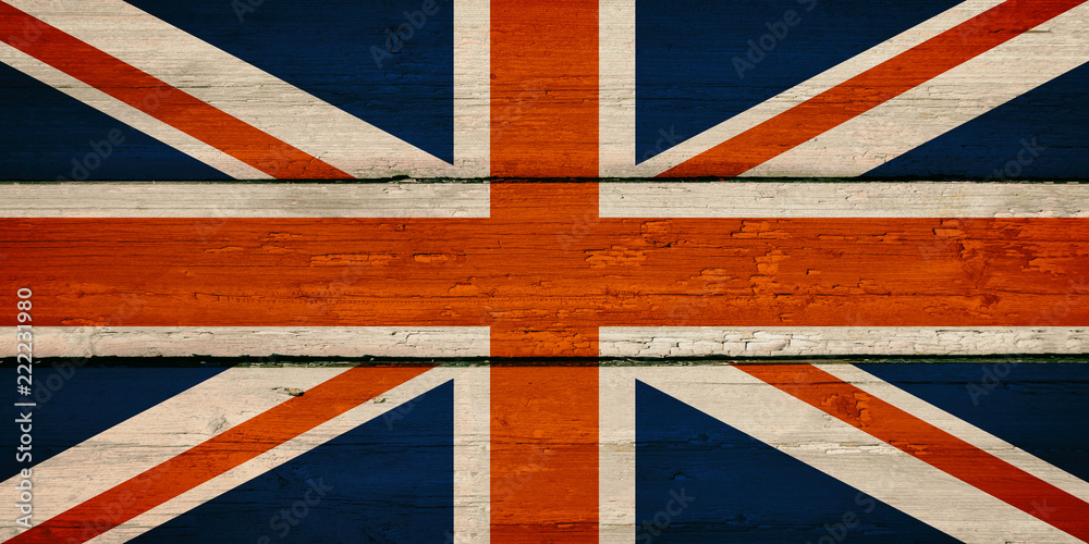 Fototapeta premium Bright Great Britain National Flag on a Wooden Background. Grunge British UK Flags Texture.