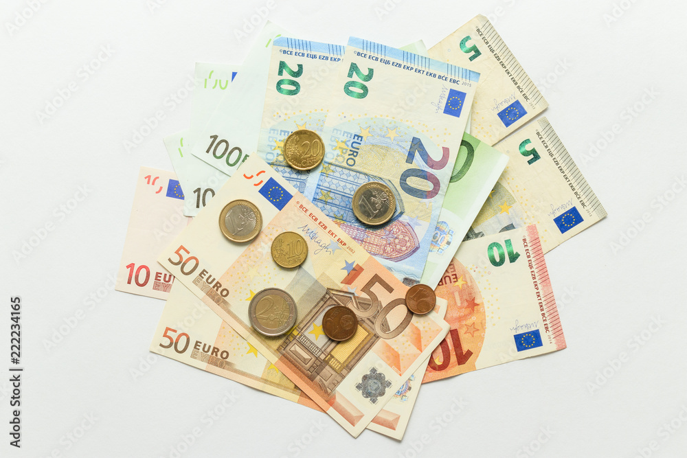 paper currency notes and coins euros, white background Stock Photo ...
