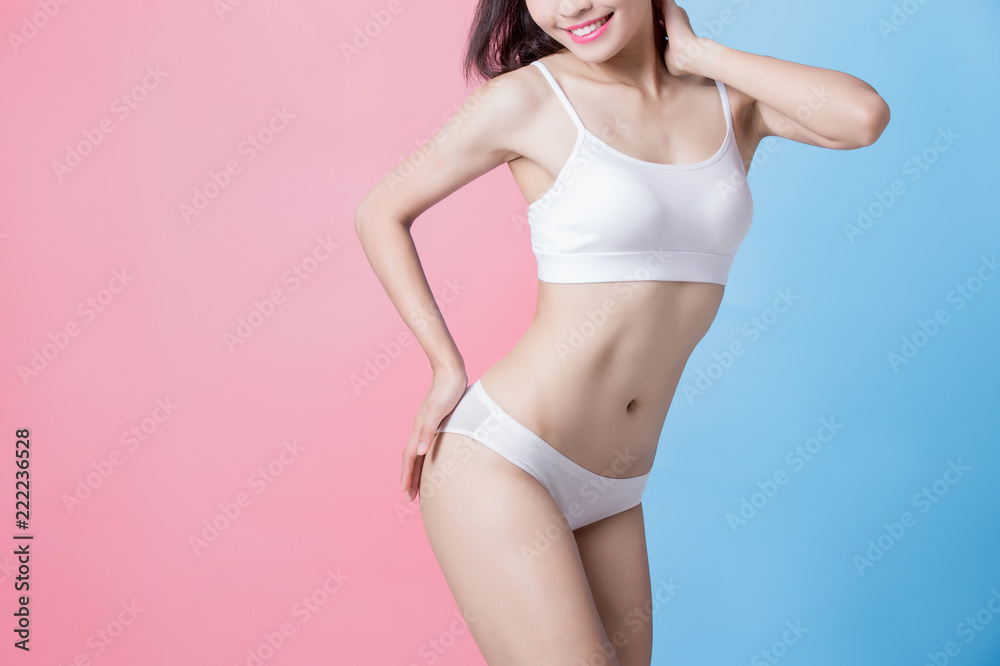 Fototapeta premium woman show her thin waist