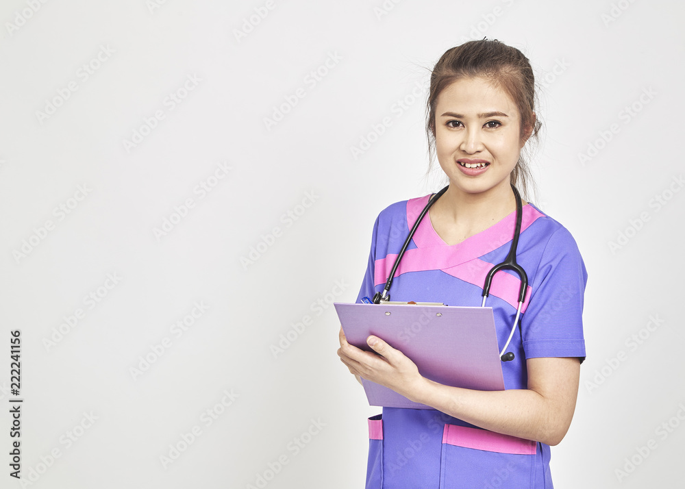 doctor with a folder in uniform standing doctor with a folder in uniform standing