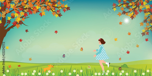 Cute little girl and dog catching butterflies on field in sunny day.