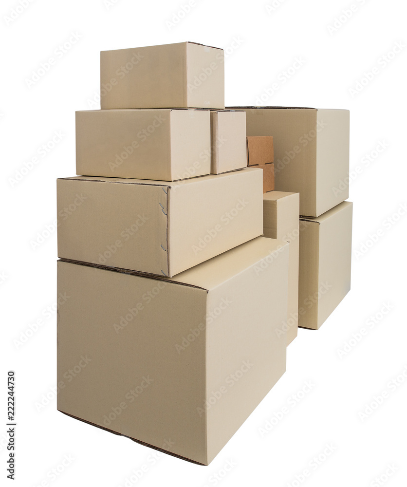 Cardboard Boxes in different sizes stacked boxes isolated on white backgrouns Cardboard Boxes in different sizes stacked boxes isolated on white backgrouns