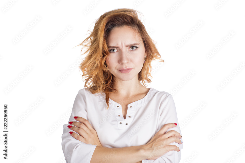 Confident woman looking at camera with angry gaze holding arms at hips. Upset housewife being offended on her husband looking formidable. Relationships, people concept Confident woman looking at camera with angry gaze holding arms at hips. Upset housewife being offended on her husband looking formidable. Relationships, people concept
