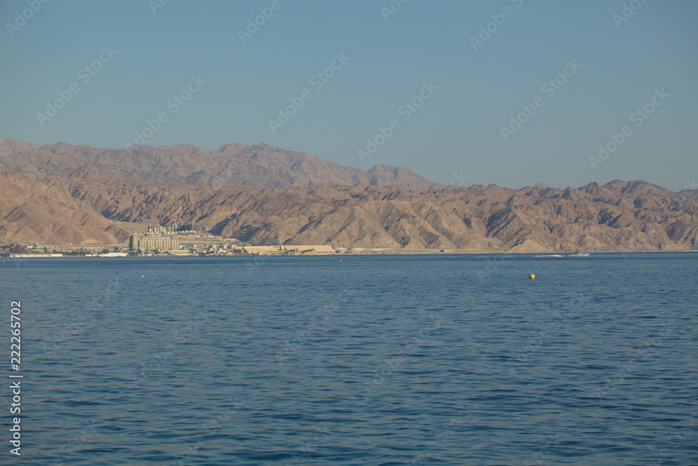 view of the mountains and Jordan through the sea from the city of Eilat Israel