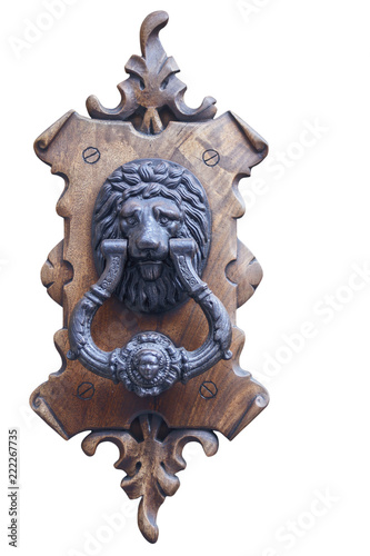 beautiful metal door handle on a wooden base isolated on a white background