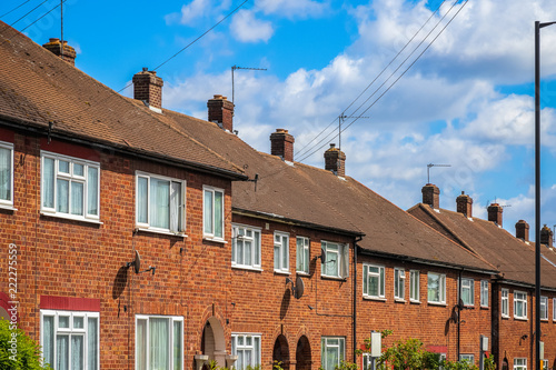 A row of red brick semi-detached houses in London photo