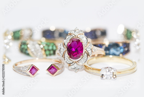 gold rings with rubies, emeralds, sapphires