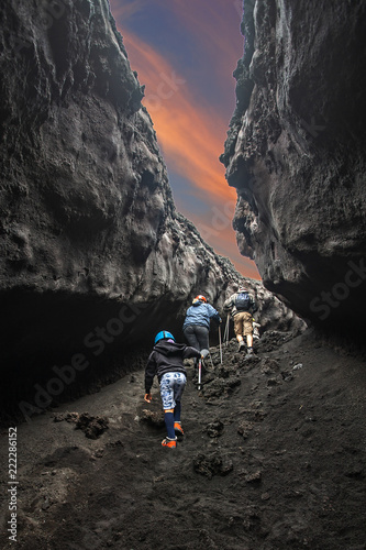 Bimbo in escursione sul vulcano Etna, Sicilia, Italy photo