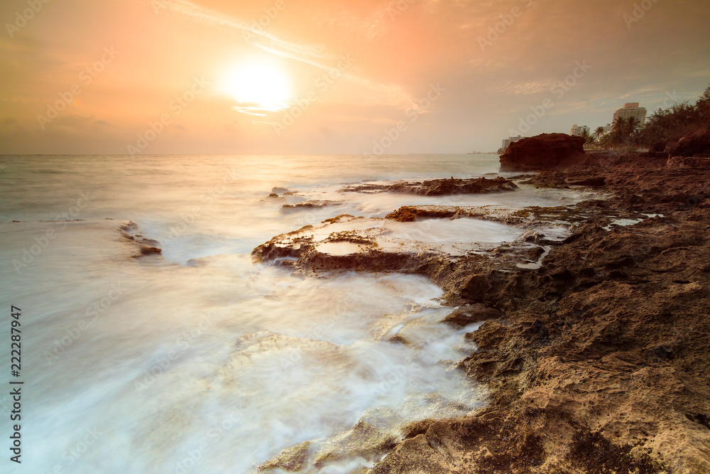Beautiful sunrise at the rugged coast of the pacific in San Juan, Puerto Rico Beautiful sunrise at the rugged coast of the pacific in San Juan, Puerto Rico