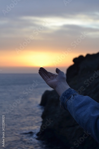 man on top of mountain