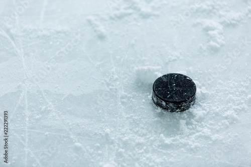Photography Hockey Puck on Ice Rink