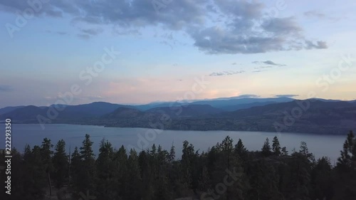 Okanagan Sunset drone view of lake and valley, british columbia canada