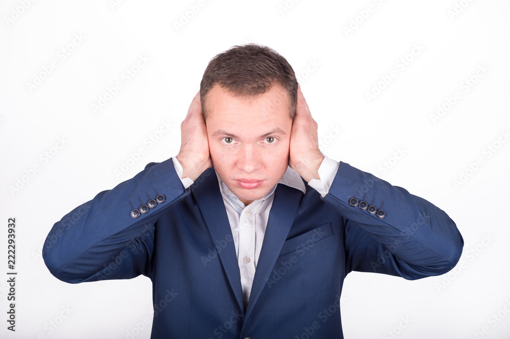 A young businessman covered his mouth with his hands. I can not listen to understand A young businessman covered his mouth with his hands. I can not listen to understand
