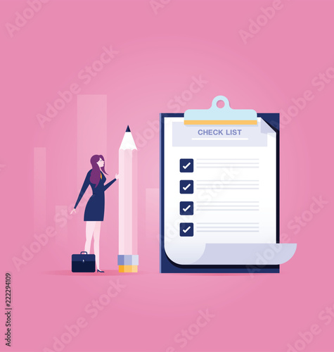 businesswoman holding a pencil near completed checklist on clipboard - Business concept