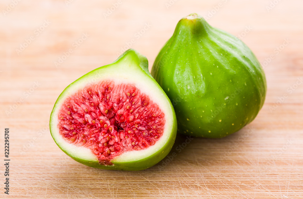 Fresh fig fruit on table, closeup Fresh fig fruit on table, closeup