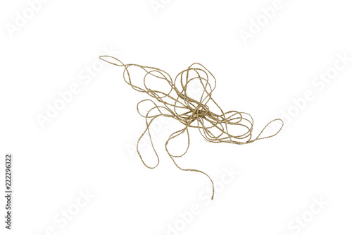 Messy tangled linen string on white background. Natural twine thread. Empty blank copy space for text.
