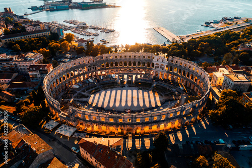 Canvastavla Pula Arena at sunset - aerial view taken by a professional drone