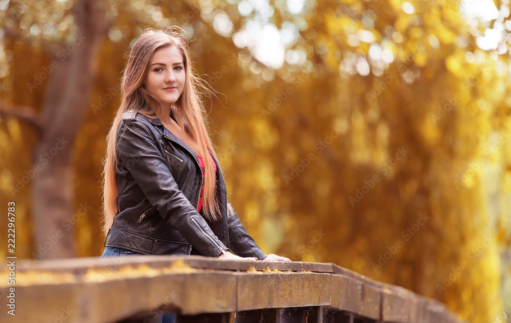 Beautiful woman in the nature an autumn's day Beautiful woman in the nature an autumn's day