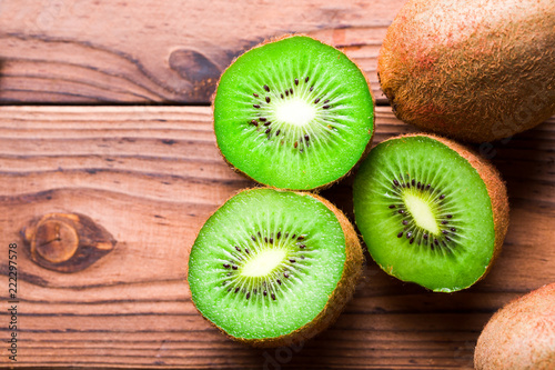 Top view of fresh kiwi fruit on wooden table