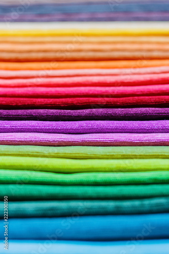 Samples of colored fabric with a brightly expressed rough texture. Vertical photography