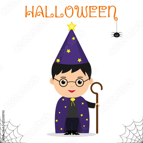Cute child dressed in a suit of the astrologer mage with a staff celebrating at a Halloween party isolated on a white background.