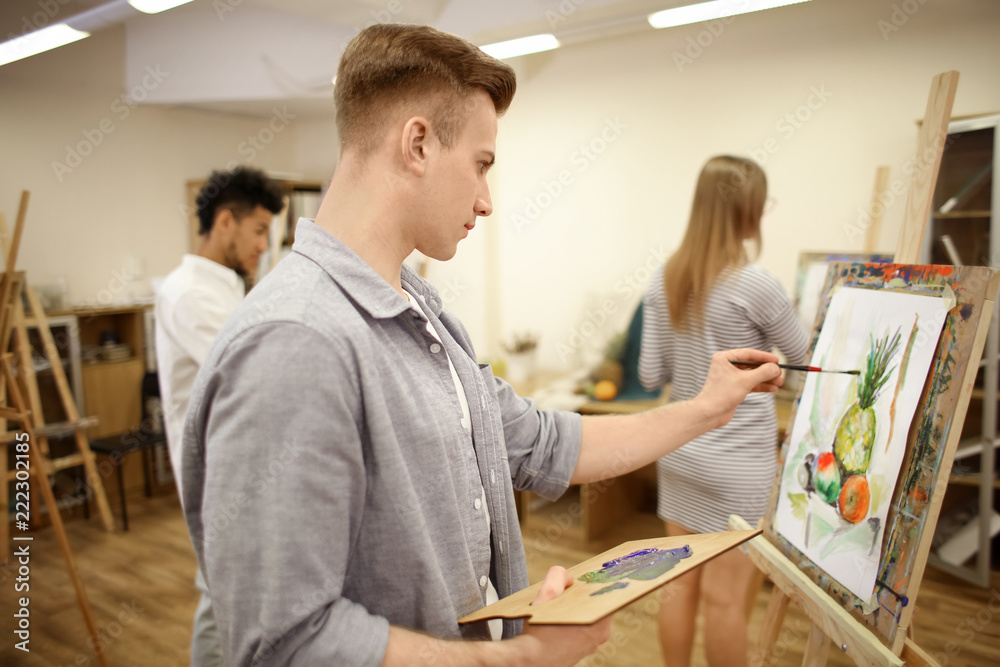 Fototapeta premium Art students painting in workshop