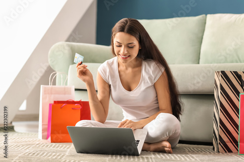 Young woman shopping online...