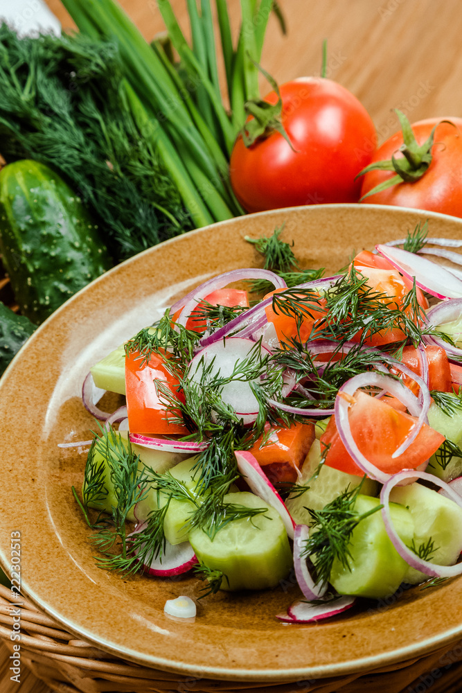 Fresh salad with tomatoes, onion and cucumbers. Fresh salad with tomatoes, onion and cucumbers.