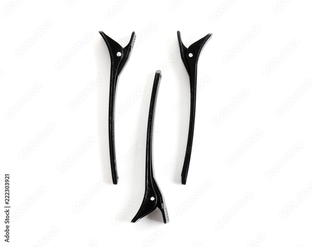 Fototapeta premium Hair clips on white background