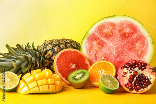 Fototapeta Naklejka Na Ścianę i Meble -  Various delicious fruits on color background