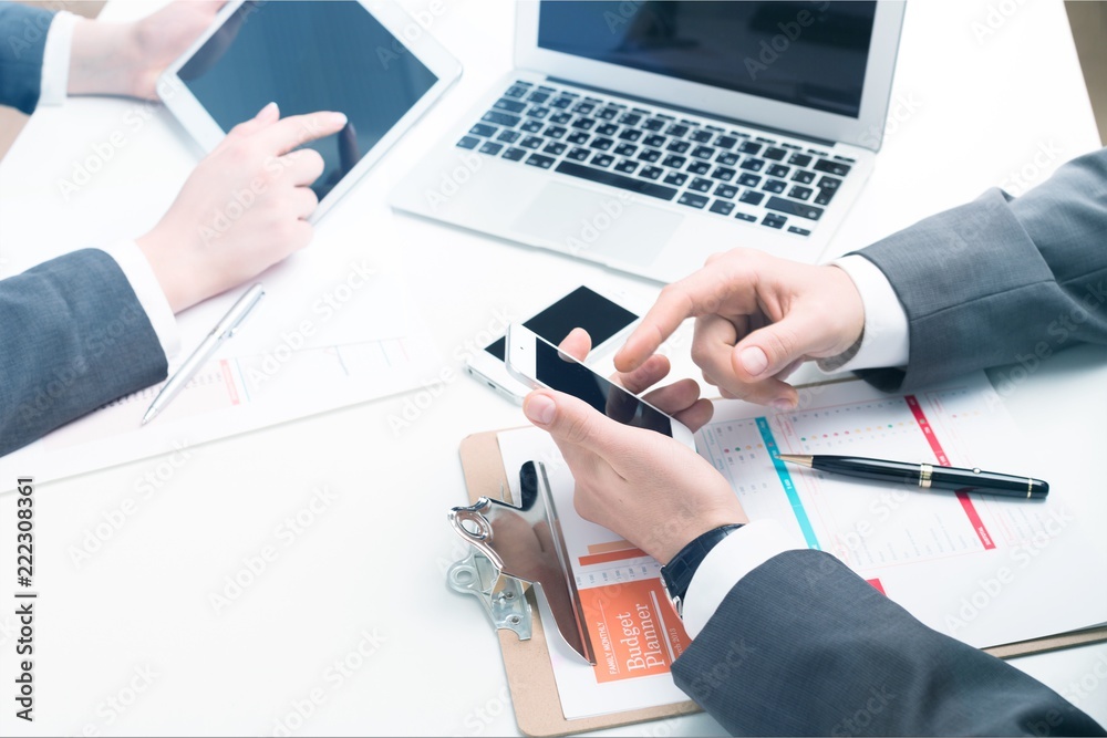 Financial data analyzing. Close-up business people with Financial data analyzing. Close-up business people with