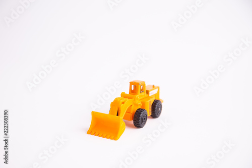 Obraz na płótnie construction shovel toy in colorful background w salonie