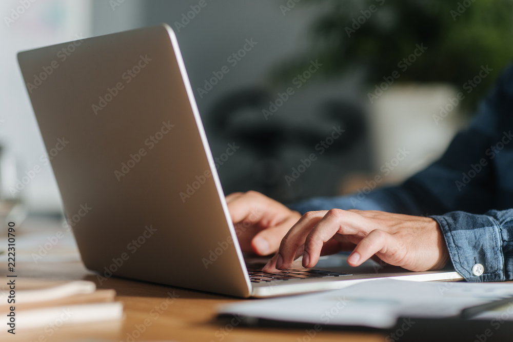 Man Working on a Laptop Man Working on a Laptop