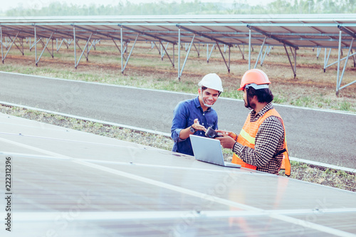 Wallpaper Mural engineer working on checking equipment in solar power plant Torontodigital.ca