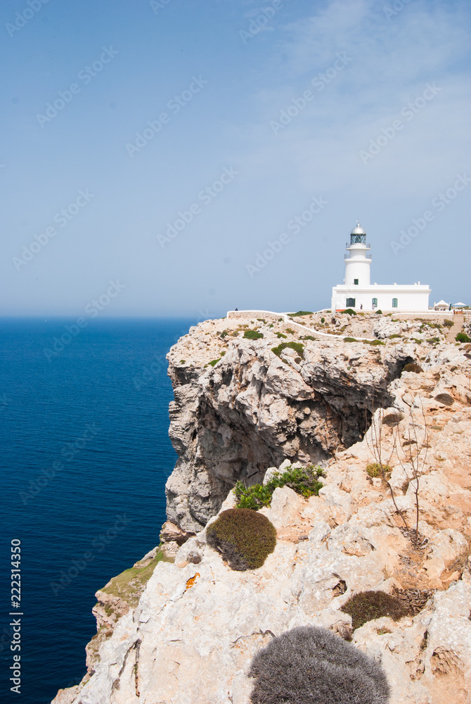 Lighthouse of the Cavalleria in Menorca on the top of the cliff