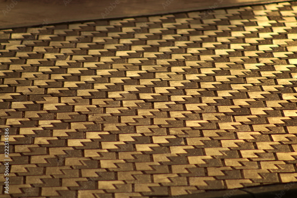 Sidewalk pattern with sunset golden light in Ibiza