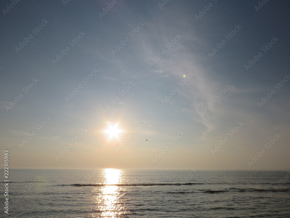 sun, over the sea, like a star, in reflection, gray, sea