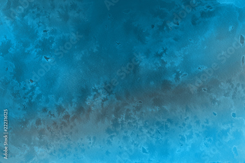 Blue winter watercolor ombre leaks and splashes texture on white watercolor paper background. Painted ice, frost and water.