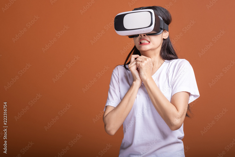 Woman wearing VR headset. Woman wearing VR headset.