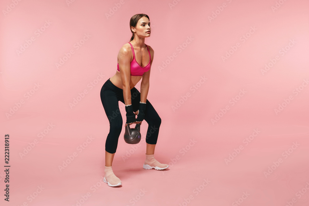 Sport Training. Athletic Woman Doing Squats With Dumbbell