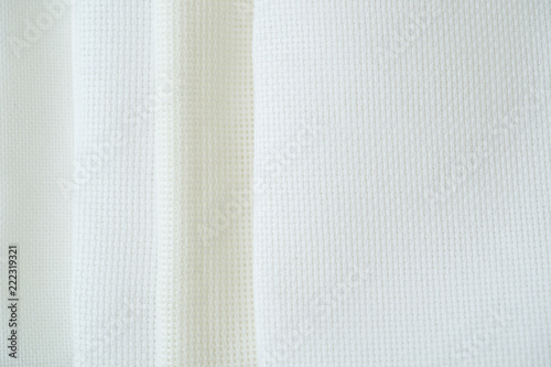 Different types of fabric for cross-stitch embroidery. White blank canvas for embroidery. © Nicole's